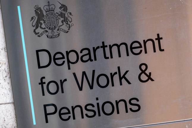 A sign outside Department for Work and Pensions wall.
