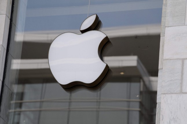 The Apple logo is seen at the entrance of an Apple store in Washington, DC