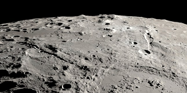This image provided by NASA shows a view from orbit looking obliquely across the surface of the moon