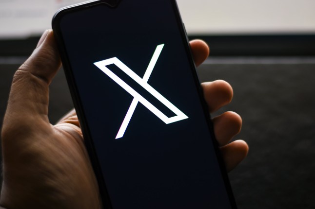 Selective focus of the Twitter new logo 'X' stock image. Elon Musk replaces the iconic blue bird symbol in July 2023 and Twitter is being rebranded as X: Dhaka, Bangladesh- July 24, 2023; Shutterstock ID 2336702031; purchase_order: -; job: -; client: -; other: -