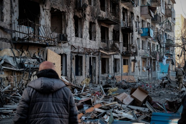 epaselect epa11952625 A person looks at damaged buildings two days after a Russian shelling in Dobropillya, Donetsk, Ukraine, 09 March 2025. The city of Dobropillya was hit late 07 March in a combined strike by Russian forces which killed at least 11 people and injured over 50 others, Ukraine???s president confirmed in the immediate aftermath of the attack. EPA/MARIA SENOVILLA