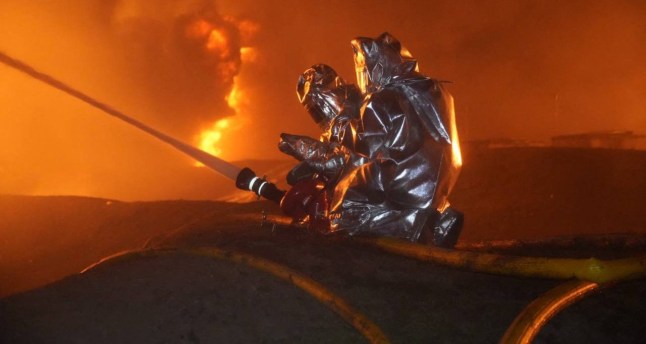 This handout photograph released by the State Emergency Service of Ukraine on March 11, 2025, shows firefighters extinguishing a fire following a strike in Odesa, amid the Russian invasion of Ukraine. (Photo by Handout / STATE EMERGENSY SERVICE OF UKRAINE / AFP) / RESTRICTED TO EDITORIAL USE - MANDATORY CREDIT "AFP PHOTO / State Emergency Service of Ukraine " - NO MARKETING NO ADVERTISING CAMPAIGNS - DISTRIBUTED AS A SERVICE TO CLIENTS (Photo by HANDOUT/STATE EMERGENSY SERVICE OF UKRAINE/AFP via Getty Images)