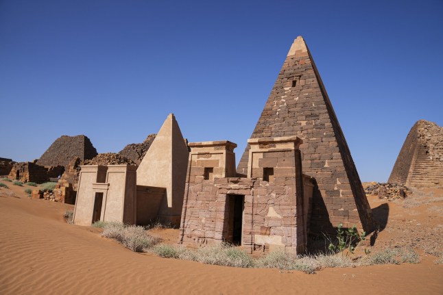 SHENDI, SUDAN - DECEMBER 28: A view of Begrawiya Pyramids located in Meroe ancient city on 200 kilometers north of the capital Khartoum, within the borders of the city of Shendi, Sudan on December 28, 2024. The 2,000-year-old pyramids, which are under UNESCO protection in Sudan, an east African country where conflicts are ongoing, continue to survive and shed light on history despite war and neglect in the middle of the desert. (Photo by Osman Bakir/Anadolu via Getty Images)