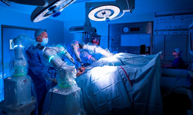 NOTE: GRAPHIC CONTENT Milton Keynes NHS Hospital undated handout photo of staff using the new Versius robotic arm technology during a surgery. Next generation surgical robots have been hailed by doctors as "a leap forward in surgical precision" in the UK. PA Photo. Issue date: Thursday February 20, 2020. The tool is used to perform minimal access surgery - also known as keyhole or laparoscopic surgery - and could reduce patient recovery times and pain. See PA story TECHNOLOGY Robots. Photo credit should read: Milton Keynes NHS Hospital/PA Wire NOTE TO EDITORS: This handout photo may only be used in for editorial reporting purposes for the contemporaneous illustration of events, things or the people in the image or facts mentioned in the caption. Reuse of the picture may require further permission from the copyright holder.