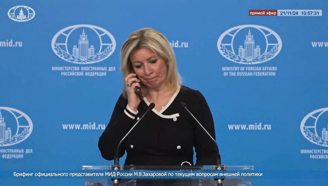A tv grab taken from handout footage released on November 21, 2024 by the Russian Foreign Ministry shows Russia's foreign ministry spokesperson, Maria Zakharova, receiving a phone call during a live press briefing ordering her not to comment on reports of a ballistic missile strike on Ukraine. An unknown male voice on the phone can be heard addressing her: "On the 'Yuzhmash' ballistic missile strike that the Westerners have started talking about, we are not commenting at all," he says, referring to an aerospace manufacturer based in the Ukrainian city of Dnipro. (Photo by RUSSIAN FOREIGN MINISTRY / AFP) / RESTRICTED TO EDITORIAL USE - MANDATORY CREDIT "AFP PHOTO / RUSSIAN FOREIGN MINISTRY" - NO MARKETING NO ADVERTISING CAMPAIGNS - DISTRIBUTED AS A SERVICE TO CLIENTS (Photo by -/RUSSIAN FOREIGN MINISTRY/AFP via Getty Images)
