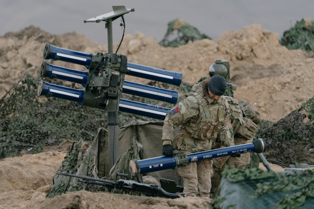 British army soldiers prepare an Lightweight Multi-Role (LMM) missile system during the Steadfast Dart 25 exercise, part of the North Atlantic Treaty Organization's (NATO) Allied Reaction Force (ARF) training in Smardan, Romania, on Wednesday, Feb. 19, 2025. The US is likely to maintain its commitment to NATO, though it may reduce its troop presence in Europe as its priorities shift to the Indo-Pacific region, a top alliance official said. Photographer: Andrei Pungovschi/Bloomberg via Getty Images