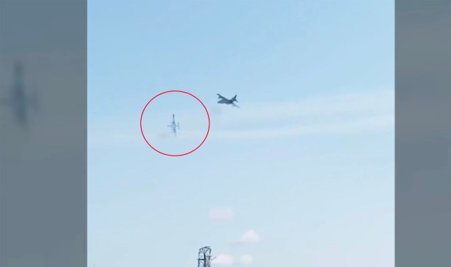 The moment Putin loses another ??15m Su-25 attack jet, pictured crashing to the ground, in frontline accident in Donetsk region as pilot cheats death in mid-air break-up