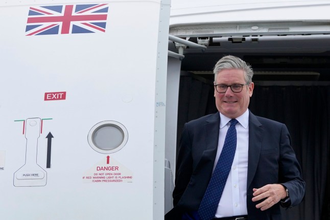 AMSTERDAM, NETHERLANDS - JUNE 24: UK Prime Minister Keir Starmer arrives at Amsterdam Schiphol Airport ahead of the NATO summit on June 24, 2025 in Amsterdam, Netherlands. This year's NATO summit, which brings together heads of state and government from across the military alliance, is being held in the Netherlands for the first time. Among other matters, members are to approve a new defense investment plan that raises target for defense spending to 5% of GDP. (Photo by Kin Cheung - WPA Pool/Getty Images)