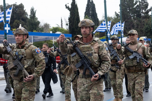 Members of the Hellenic Special Forces parade in front of the Greek Parliament during Greek Independence Day in Athens, Greece, on March 25 (Photo by Sophia Potsi/NurPhoto via Getty Images).