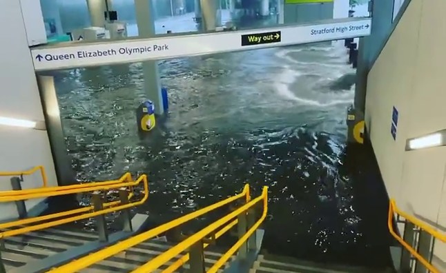 Pudding Mill Lane DLR Station flooded, 25/07/2021 - Twitter video by Rob Day - https://twitter.com/R0bday/status/1419339808372142083
