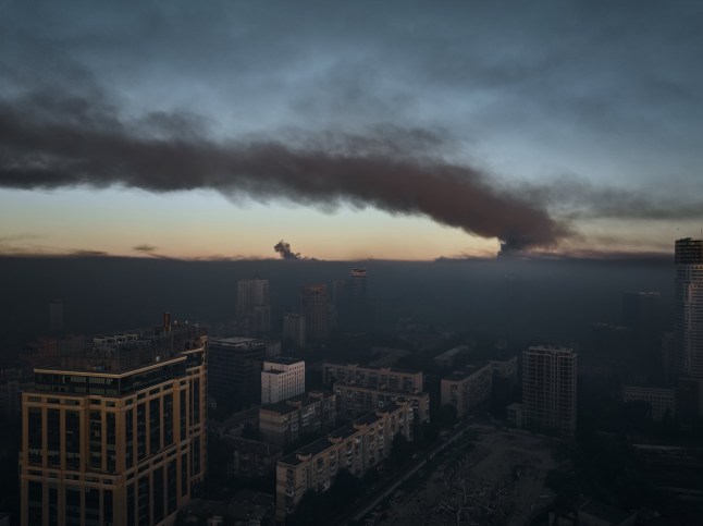 KYIV, UKRAINE - JULY 4: A large plume of smoke covers the city after a mass drone and missile attack by the Russian Federation on the capital on Kyiv July 4, 2025 in Kyiv, Ukraine. Ukrainian authorities reported at least 23 people have been injured in the overnight drone attack on Kyiv. The attack also damaged railway infrastructure and set buildings and cars on fire in various districts throughout the city. (Photo by Kostiantyn Liberov/Libkos/Getty Images)