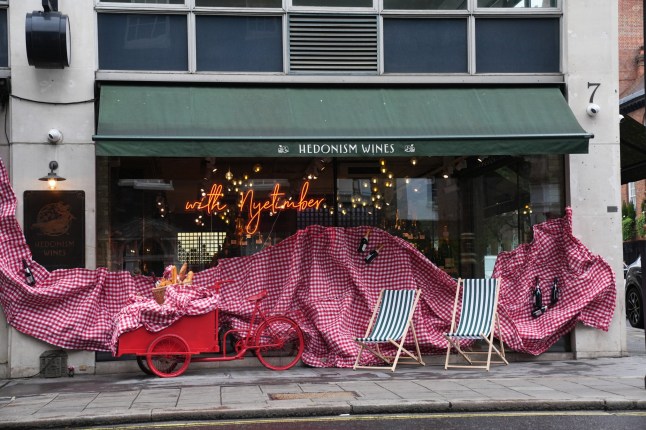 The exterior of Hedonism Wines on Davies Street in London, one of the businesses that Dylan Earl and Jake Reeves admitted plotting to set fire to. Three men have been found guilty at the Old Bailey of an arson attack on a warehouse linked to Ukraine on behalf of the terrorist Wagner Group. Picture date: Wednesday July 2, 2025. PA Photo. Photo credit should read: Lucy North/PA Wire