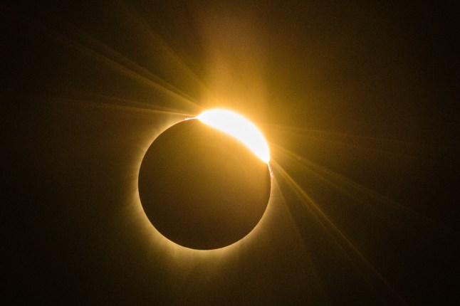 TOPSHOT - The total solar eclipse Monday August 21, 2017 in Madras, Oregon. Emotional sky-gazers stood transfixed across North America Monday as the Sun vanished behind the Moon in a rare total eclipse that swept the continent coast-to-coast for the first time in nearly a century. (Photo by ROB KERR / AFP) (Photo by ROB KERR/AFP via Getty Images)