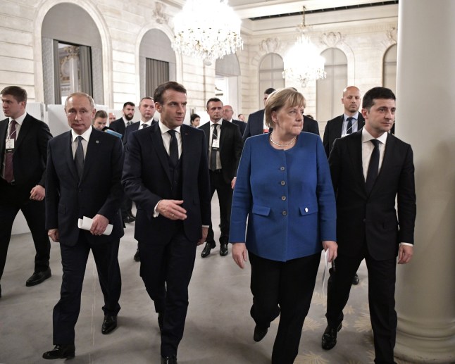 epa08058850 Russian President Vladimir Putin (L), French President Emmanuel Macron (2-L), German Chancellor Angela Merkel (2-R) and Ukrainian President Volodymyr Zelensky (R) walk after their talks on Ukraine at the Elysee Palace in Paris, France, 10 December 2019. EPA/ALEXEI NIKOLSKY/SPUTNIK/KREMLIN POOL MANDATORY CREDIT/SPUTNIK