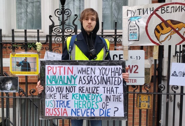 Alexander Frolov protesting outside of the Russian Embassy in London
