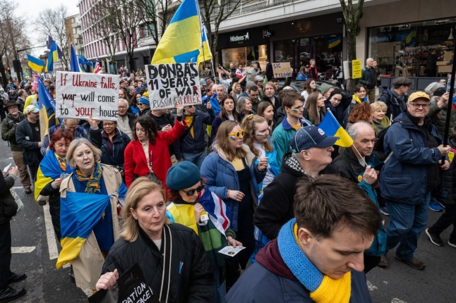 LONDON, ENGLAND - FEBRUARY 22: Protestors march to the Russian Embassy to demand a withdrawal of Russian troops from all Ukrainian territory on February 22, 2025 in London, England. Monday marks the third anniversary of Russia's invasion of Ukraine. In recent days a US and Russian delegation have met in Saudi Arabia to lay the groundwork for Donald Trump and Vladimir Putin to negotiate an end to the three-year war. Ukraine and Europe have so far not been offered access to these negotiations and Donald Trump has issued tirades against President Zelenskyy on social media platforms that echoes Russia's views. Europe mostly stands united with Ukraine and supports Zelenskyy as Ukraine's democratically elected leader. (Photo by Guy Smallman/Getty Images)
