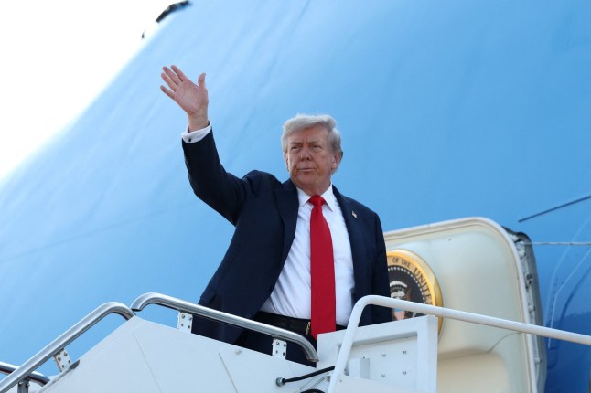 U.S. President Donald Trump boards Air Force One as he departs for Alaska to meet with Russian President Vladimir Putin to negotiate for an end to the war in Ukraine, from Joint Base Andrews in Maryland, U.S., August 15, 2025. REUTERS/Kevin Lamarque
