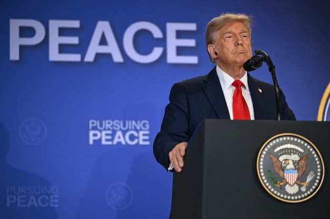 US President Donald Trump listens during a joint press conference with Russian President Vladimir Putin after participating in a US-Russia summit on Ukraine at Joint Base Elmendorf-Richardson in Anchorage, Alaska, on August 15, 2025. (Photo by ANDREW CABALLERO-REYNOLDS / AFP) (Photo by ANDREW CABALLERO-REYNOLDS/AFP via Getty Images)