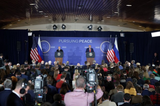 U.S. President Donald Trump and Russian President Vladimir Putin hold a press conference following their meeting to negotiate an end to the war in Ukraine, at Joint Base Elmendorf-Richardson in Anchorage, Alaska, U.S., August 15, 2025. REUTERS/Jeenah Moon