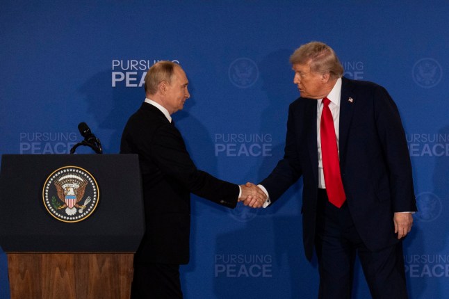 President Donald Trump, right, and Russia's President Vladimir Putin shake hands during a joint press conference at Joint Base Elmendorf-Richardson, Alaska, Friday, Aug. 15, 2025. (AP Photo/Jae C. Hong)