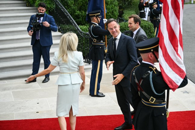 NATO Secretary-General Mark Rutte is greeted by US Chief of Protocol Monica Crowley (L) upon arrival at the White House South Portico in Washington, DC, on August 18, 2025. European leaders join Ukrainian President Volodymyr Zelensky in talks with US President Donald Trump on August 18, as they try to find a way to end Russia's offensive. The leaders heading to Washington on Monday to appear alongside Zelensky call themselves the "coalition of the willing." (Photo by Mandel NGAN / AFP) (Photo by MANDEL NGAN/AFP via Getty Images)