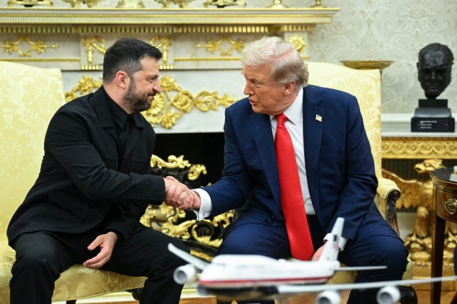 Ukrainian President Volodymyr Zelensky and US President Donald Trump shake hands during a meeting in the Oval Office of the White House in Washington, DC, on August 18, 2025. European leaders join Ukrainian President Volodymyr Zelensky in talks with US President Donald Trump on August 18, as they try to find a way to end Russia's offensive. The leaders heading to Washington on Monday to appear alongside Zelensky call themselves the "coalition of the willing." (Photo by Mandel NGAN / AFP) (Photo by MANDEL NGAN/AFP via Getty Images)