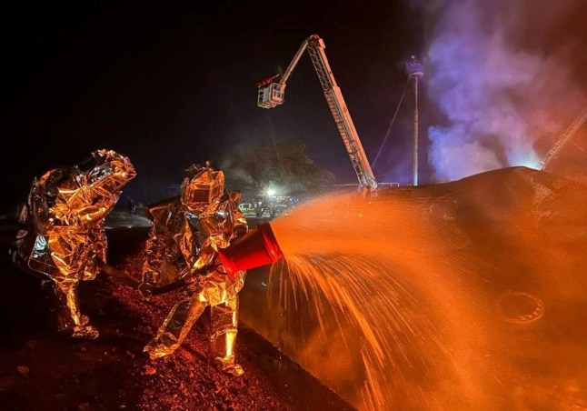 Firefighters work at the site of a fuel storage facility hit by a Russian drone strike, amid Russia's attack on Ukraine, in Odesa region, Ukraine August 20, 2025. Press service of the State Emergency Service of Ukraine in Odesa region/Handout via REUTERS ATTENTION EDITORS - THIS IMAGE HAS BEEN SUPPLIED BY A THIRD PARTY. DO NOT OBSCURE LOGO. TPX IMAGES OF THE DAY