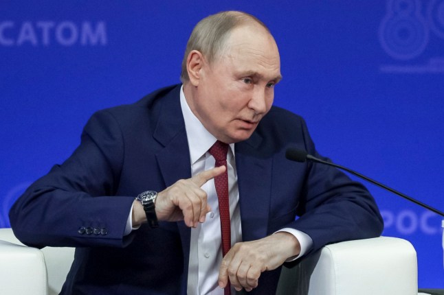 Russian President Vladimir Putin gestures as he speaks during a meeting with nuclear industry personnel at the Russian Federal Nuclear Center - All-Russian Scientific Research Institute of Experimental Physics (RFNC-VNIIEF), in Sarov, Nizhny Novgorod region, Russia, Friday, Aug. 22, 2025. (Gavriil Grigorov, Sputnik, Kremlin Pool Photo via AP)