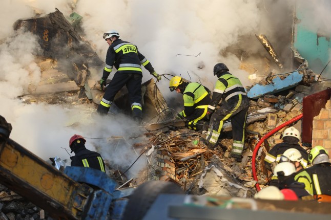 KYIV, UKRAINE - AUGUST 28: Search and rescue operation continues in a residential building partially destroyed by a Russian missile strike on August 28, 2025 in Kyiv, Ukraine. As a result of the massive Russian attack on the night of August 28 in Kyiv, dozens of people were injured, there are deaths, including children, residential and non-residential buildings were damaged, UAV debris fell, and fires occurred. (Photo by Yevhenii Zavhorodnii/Global Images Ukraine via Getty Images)
