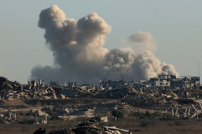 This picture taken from a position near Israel's border with the Gaza Strip shows smoke billowing during an Israeli strike on the besieged Palestinian territory, on August 29, 2025, amid the ongoing war between Israel and the Palestinian militant group Hamas. The Israeli military declared Gaza City "a dangerous combat zone" on August 29, as it prepared to conquer the Palestinian territory's largest city after almost two years of war. (Photo by Jack GUEZ / AFP) (Photo by JACK GUEZ/AFP via Getty Images)