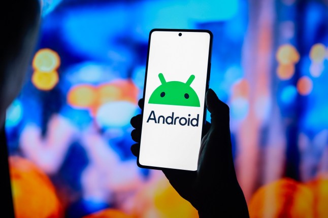 A picture of a mobile phone with the screen showing the Android logo.