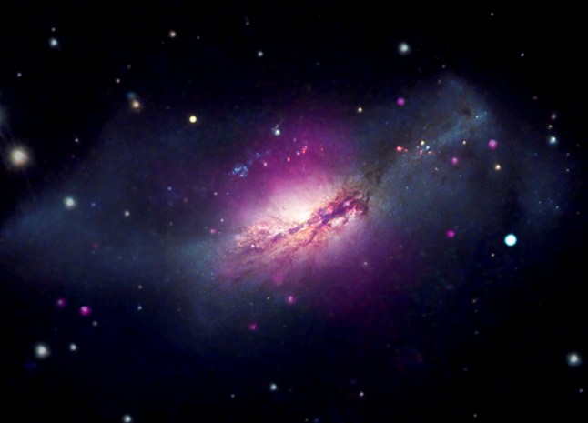 NGC 2146 is a spiral galaxy with one of its dusty arms blocking the view of the galaxy?s center from Earth?s perspective. NASA astronomers say they have captured "cosmic razzle-dazzle" in a jaw-dropping new gallery of space images. The eye-catching compilation, released Wednesday (23 July), features data from NASA?s Chandra X-ray Observatory along with a host of other telescopes including NASA?s James Webb Space Telescope, Hubble Space Telescope and more. The space agency said: "As NASA?s flagship X-ray telescope, Chandra observes many different exciting phenomena that reveal themselves in energetic radiation. There are nine objects in this new space-based light pageant, ranging from nearby pockets of star formation to distant galaxies with giant black holes." Photo released 24/07/2025