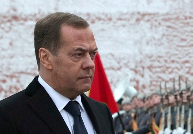 Russia's Deputy head of the Security Council Dmitry Medvedev takes part in a wreath laying ceremony marking Defender of the Fatherland Day at the Tomb of the Unknown Soldier by the Kremlin Wall in Moscow, Russia, February 23, 2024.