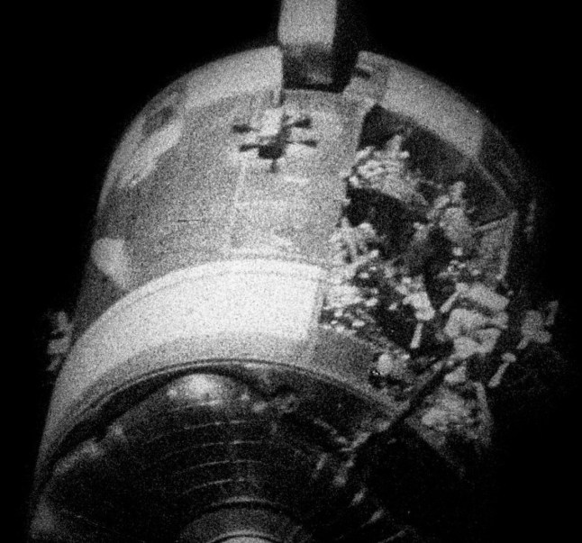 Apollo13 - view of the crippled Service Module after separation.