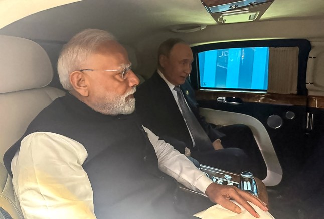 This handout photograph taken and posted on the X (formerly Twitter) account of India's Prime Minister Narendra Modi on September 1, 2025, shows Indian Prime Minister Narendra Modi (L) and Russia's President Vladimir Putin leaving together in a car for the venue of their bilateral meeting after attending the Shanghai Cooperation Organisation (SCO) Summit in Tianjin. (Photo by X account of India's Prime Minister Narendra Modi (@narendramodi) / AFP) / RESTRICTED TO EDITORIAL USE - MANDATORY CREDIT "AFP PHOTO /X account of India's Prime Minister Narendra Modi (@narendramodi)/ HANDOUT / " - NO MARKETING NO ADVERTISING CAMPAIGNS - DISTRIBUTED AS A SERVICE TO CLIENTS (Photo by -/X account of India's Prime Minister Narendra Modi (@narendramodi)/AFP via Getty Images)