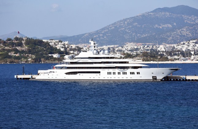 The 106m-long and 18m-high super luxury motor yacht Amadea, one of the largest yacht in the world is seen after anchored at pier in Pasatarlasi for bunkering with 9 fuel trucks, on February 18, 2020 in Bodrum district of Mugla province in Turkey. Amadea, the Cayman-flagged motor yacht, arrived from France and entered in Turkey passing through Greece. Amadeus's interior layout sleeps up to 16 guests in 8 cabins, including a master suite, a VIP stateroom, with a helipad. (Photo by Osman Uras/Anadolu Agency via Getty Images)