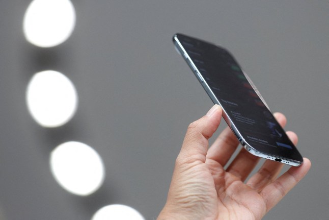 A person holds an iPhone air during Apple's event at the Steve Jobs Theater on its campus in Cupertino, California, U.S. September 9, 2025. REUTERS/Manuel Orbegozo