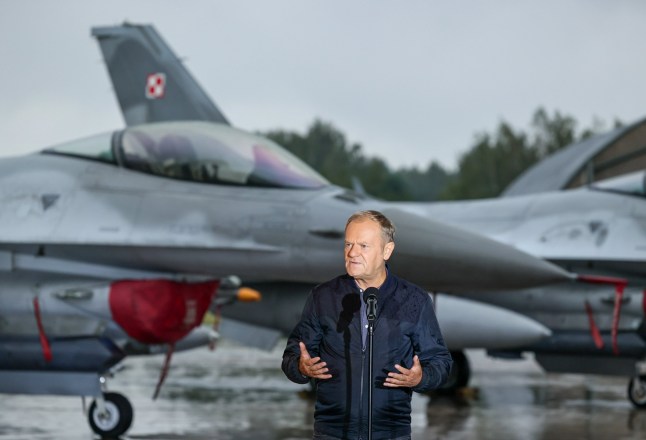 Mandatory Credit: Photo by Anita Walczewska/East News/Shutterstock (15481146g) Prime minister of Poland Donald Tusk attends a meeting with Polish pilots of F-16 Fighting Falcon fighter jets at the 32nd Air Base on September 11, 2025 in Lask in central Poland. The meeting comes a day after an unprecedented breach of Polish airspace by Russian drones. At least 19 Russian drones had been confirmed to enter Polish airspace at night and in the early morning on September 10. Donald Tusk meets with Polish jet fighter pilots, Forest, Poland - 11 Sep 2025