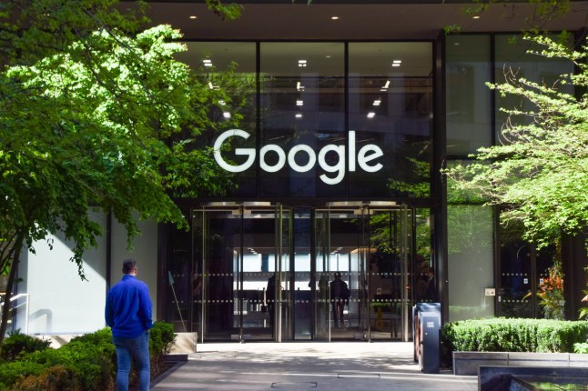 London, UK - April 17 2025: a person walks outside Google headquarters in Pancras Square, King's Cross