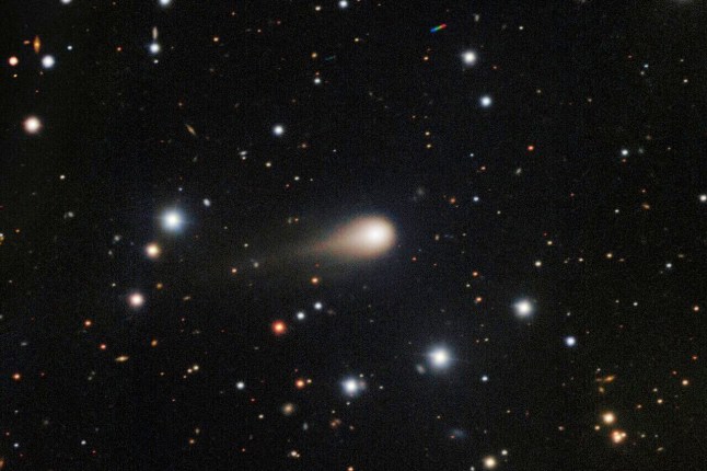 This image composed from multiple exposures and provided by NSF's NOIRLab shows a comet streaking across a star field above the International Gemini Observatory on Cerro Pachon, near La Serena, Chile. (NSF's NoirLab via AP)