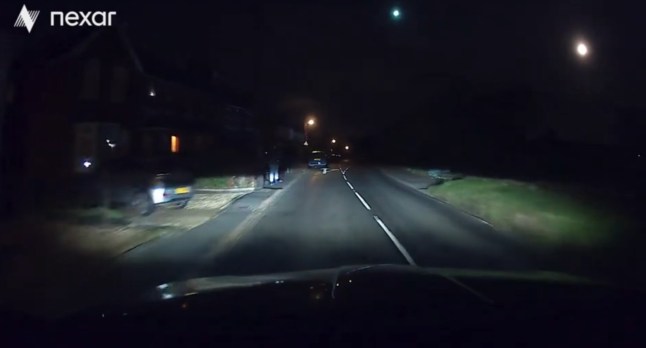 The green 'meteor' comes into frame of a witness's dashcam footage (Picture: TikTok/stuknightdj)