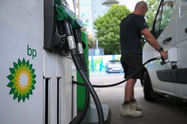 A customer fills up a vehicle with fuel at a BP Plc petrol station in London, UK, on Monday, Aug. 4, 2025.