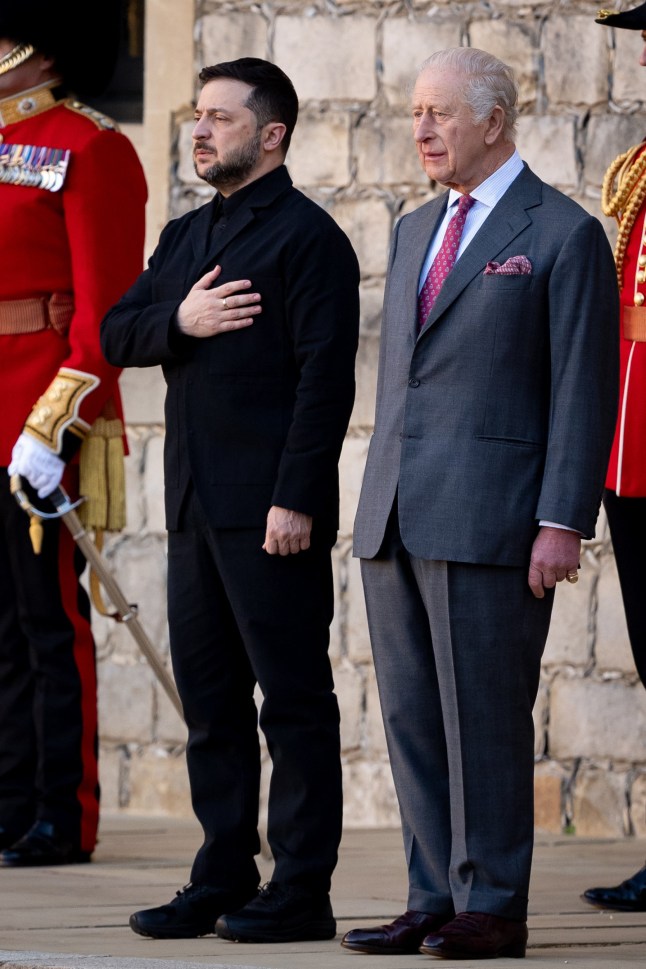King Charles III and Ukrainian President Volodymyr Zelensky take the salute before inspecting a guard of honour at Windsor Castle, Berkshire. Picture date: Friday October 24, 2025. PA Photo. Photo credit should read: Aaron Chown/PA Wire