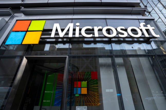 NEW YORK, NEW YORK - NOVEMBER 25: A view of the Microsoft corporate logo in front of the Microsoft Office building on 41st street and 8th avenue on November 25, 2024 in New York City. A worldwide Microsoft outage is disrupting many Microsoft services including Outlook, Exchange Online and Teams. (Photo by Craig T Fruchtman/Getty Images)