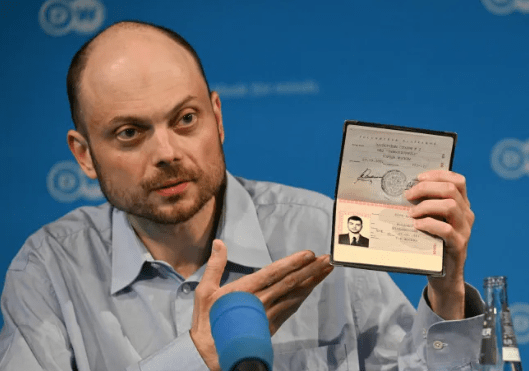 he Russian opposition politician holds up his now expired Russian identity document during a press conference on August 2, 2024 in Bonn (Picture: AFP)
