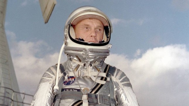Astronaut John H. Glenn Jr. in his silver Mercury spacesuit during pre- flight training activities at Cape Canaveral.