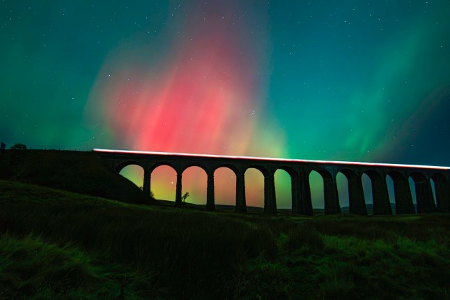 Northern Lights over Ribblehead Viaduct, Carnforth, Yorkshire. October 10 2024. Photo released October 11. 2024.