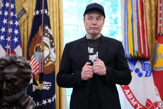 WASHINGTON, DC - MAY 30: Tesla CEO Elon Musk listens as U.S. President Donald Trump speaks to reporters in the Oval Office of the White House on May 30, 2025 in Washington, DC. Musk, who served as an adviser to Trump and led the Department of Government Efficiency, announced he would leave his role the Trump administration to refocus on his businesses. (Photo by Kevin Dietsch/Getty Images) *** BESTPIX *** 14782985