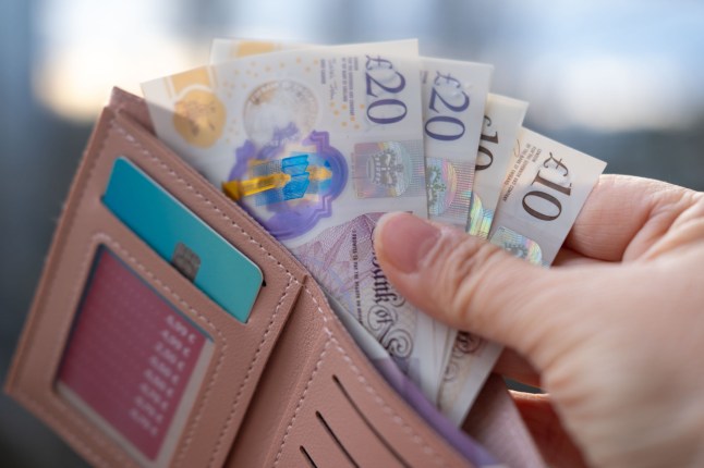 wallet with British GBP banknotes, cash in female hands, counting uk pounds bills, paper money, Money Management Accuracy, payments to fund, financial freedom, save up for vacation