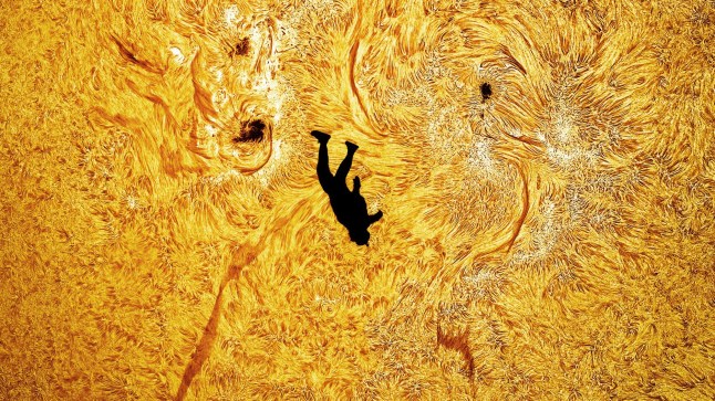 A STUNNING image of a skydiver appearing to freefall from the Sun has become a red-hot sensation among photography and space enthusiasts. Andrew McCarthy said ?immense planning and technical precision? were required for him to capture The Fall of Icarus, named after the Greek myth. He had to align the Sun?s angle with a safe exit altitude for friend Gabriel Brown, who jumped from a paramotor at 3,500ft. To get his ?preposterous but real? shot ? with both the Sun?s surface and Mr Brown in focus ? the US-based photographer positioned his camera on the ground two miles away. ?I absolutely love the contrast of the small human against our huge, dynamic star,? Mr McCarthy said as his result went viral on social media.